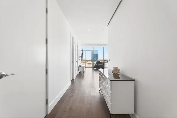 a view of a kitchen from the hallway