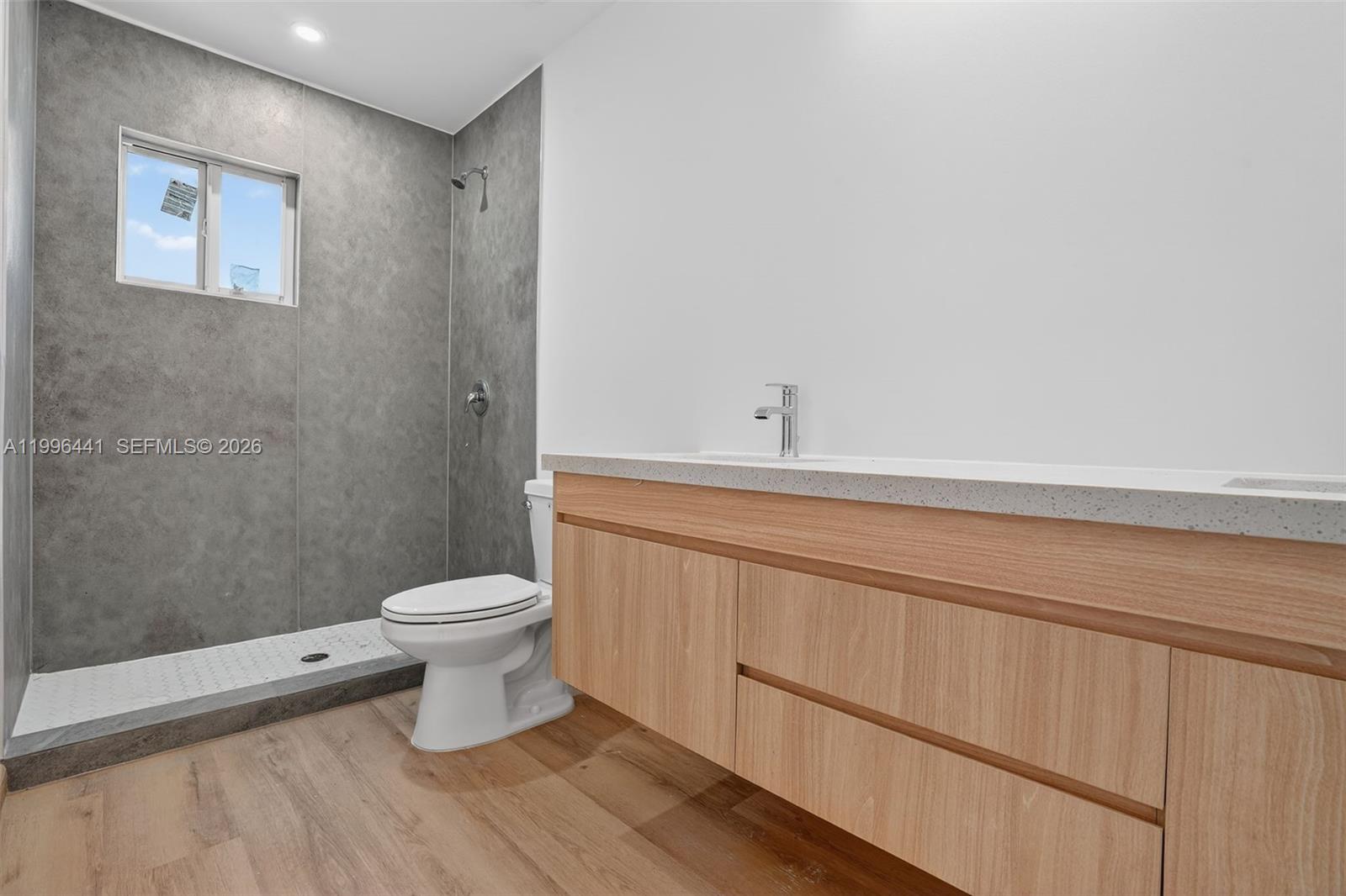 1515 Redland Road, Unit 1 Florida City, FL 33034 - Photo 6 of 13 a bathroom with a toilet and a sink