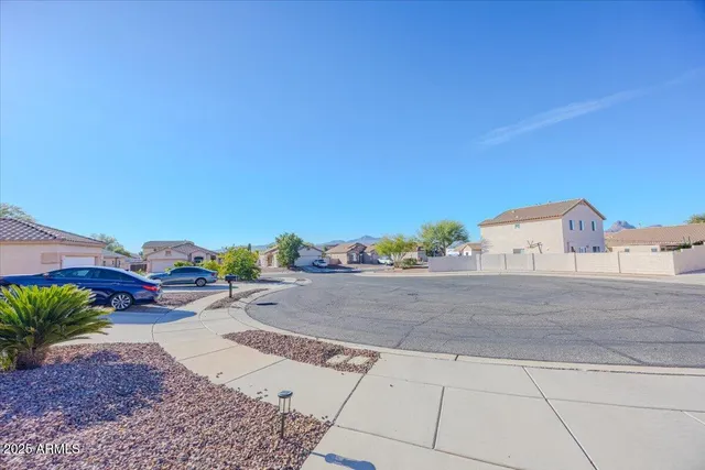 a view of a street with a houses