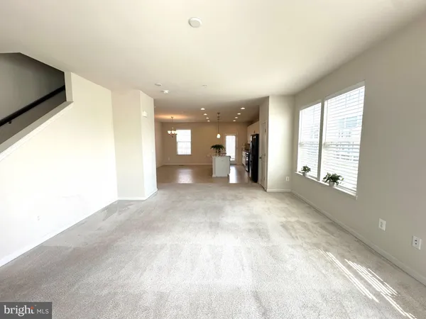 a view of a livingroom with a staircase