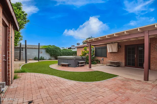 a view of a backyard with a garden