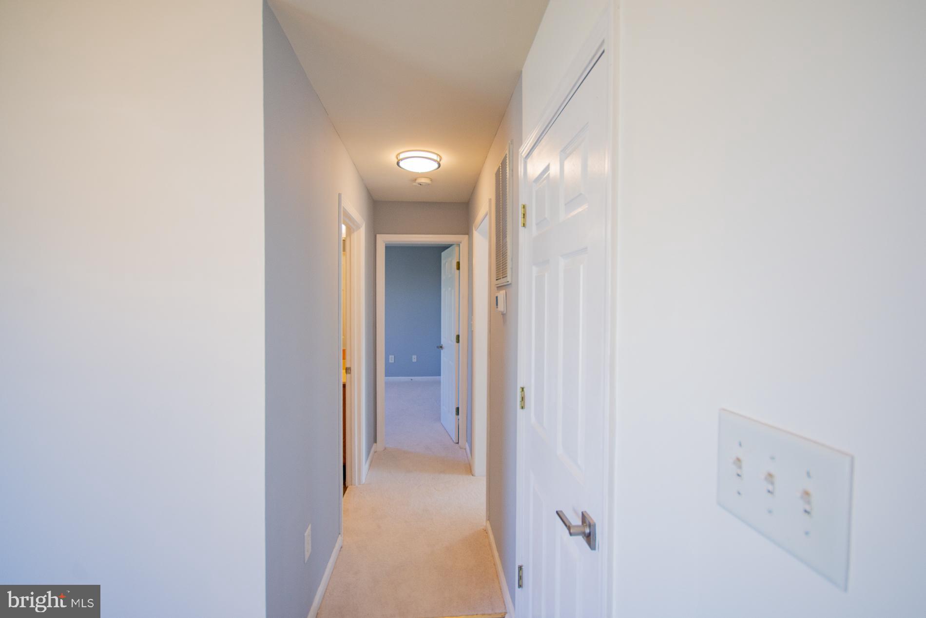 40 Stiles Way Ranson, WV 25438 - Photo 17 of 44 a view of a hallway with elevator