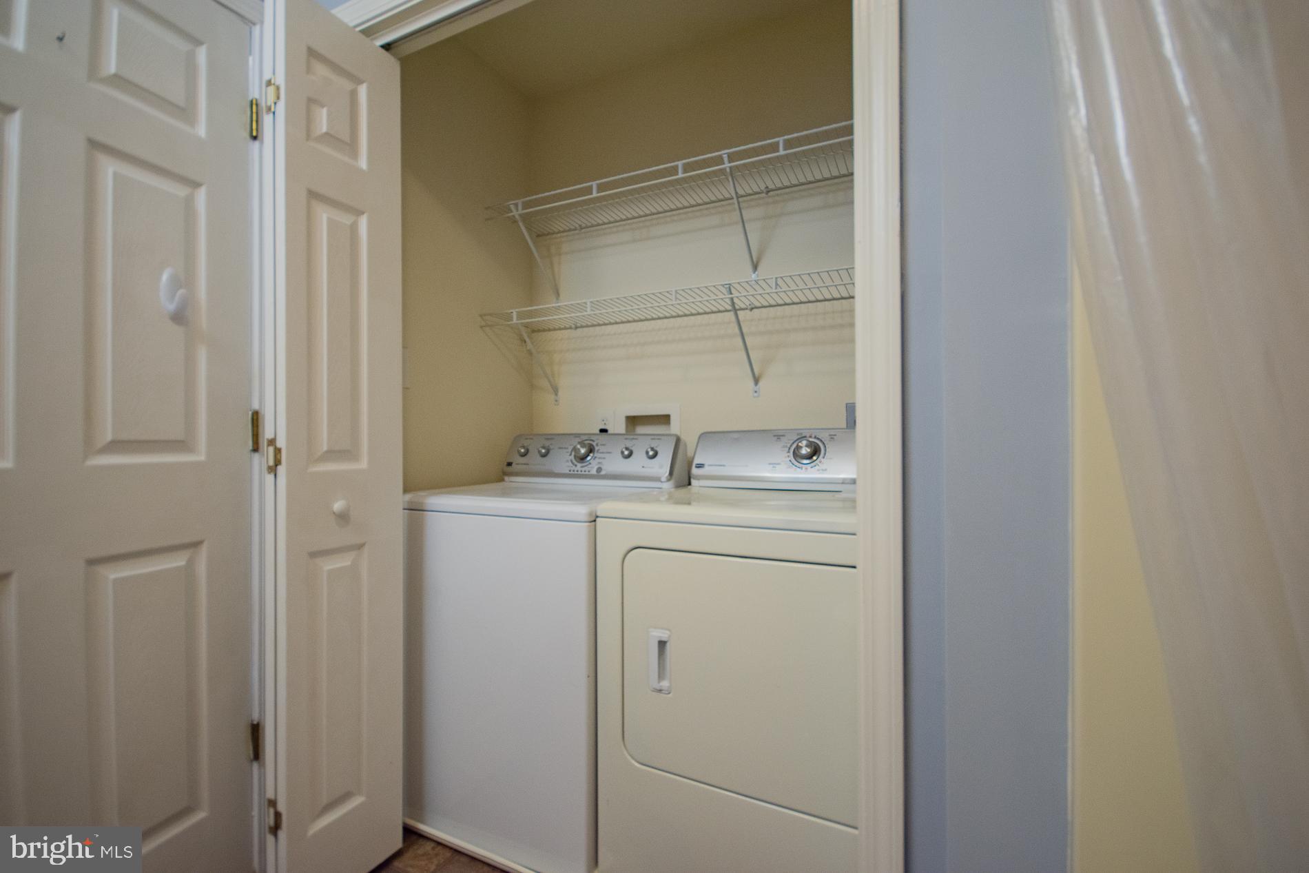 40 Stiles Way Ranson, WV 25438 - Photo 18 of 44 a utility room with dryer and washer
