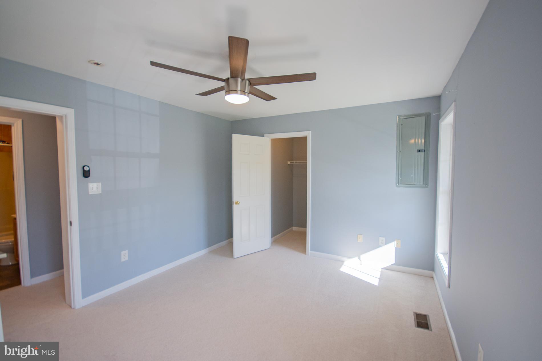 40 Stiles Way Ranson, WV 25438 - Photo 24 of 44 a view of an empty room with a ceiling fan