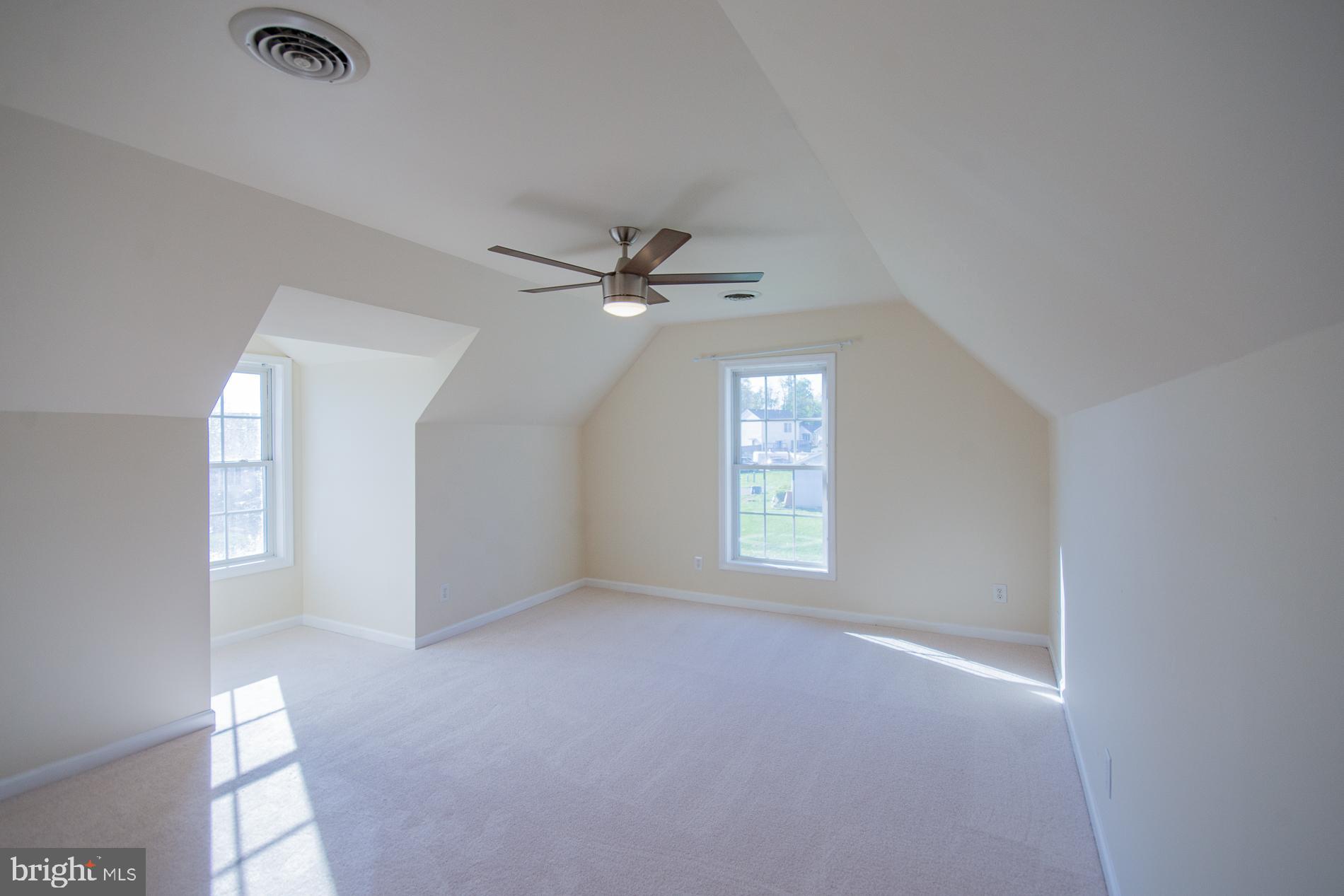 40 Stiles Way Ranson, WV 25438 - Photo 32 of 44 a view of an empty room with a window