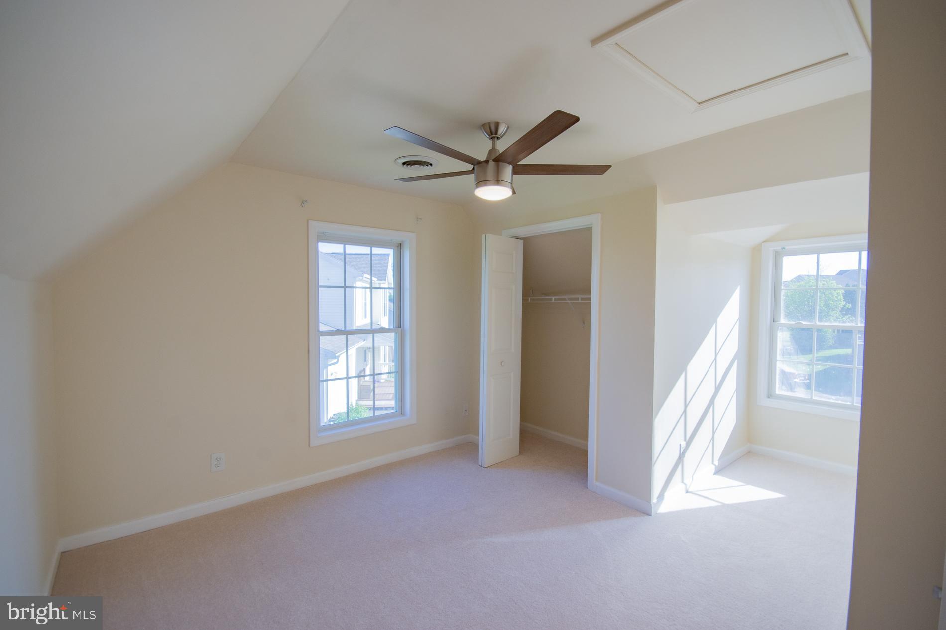 40 Stiles Way Ranson, WV 25438 - Photo 36 of 44 an empty room with windows and fan