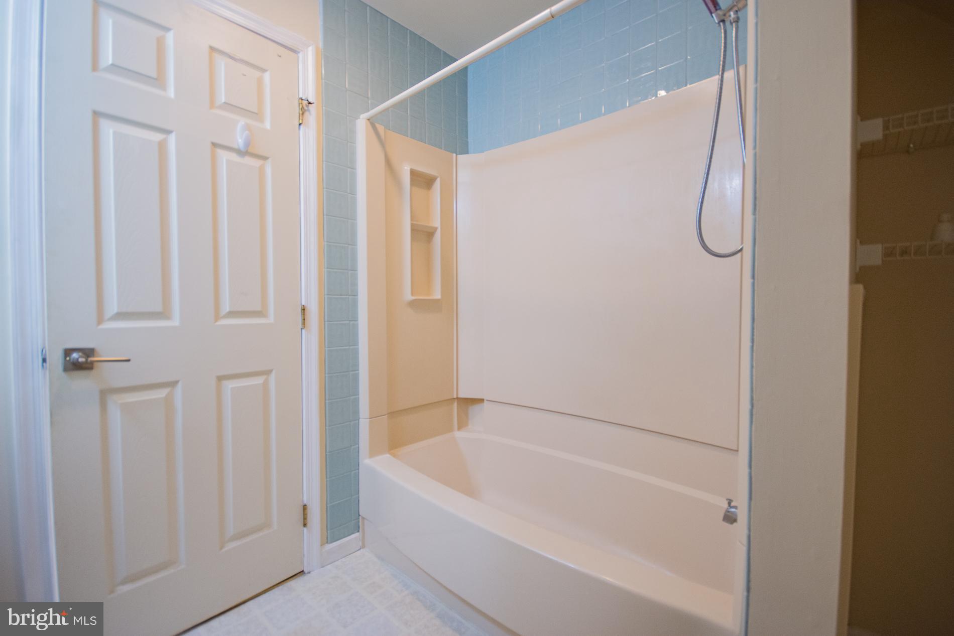 40 Stiles Way Ranson, WV 25438 - Photo 40 of 44 a bathroom with a bath tub