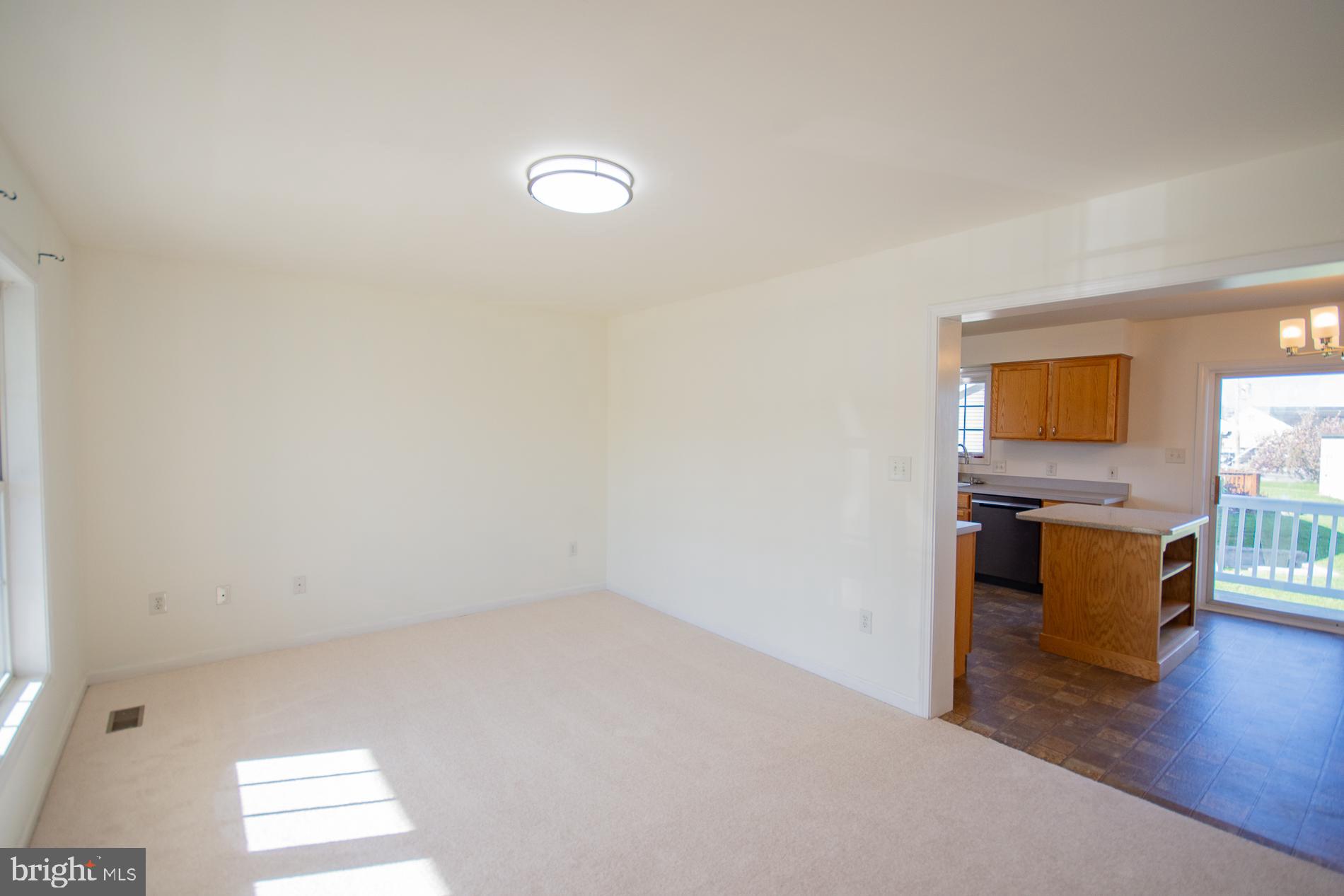 40 Stiles Way Ranson, WV 25438 - Photo 6 of 44 a view of an empty room and kitchen