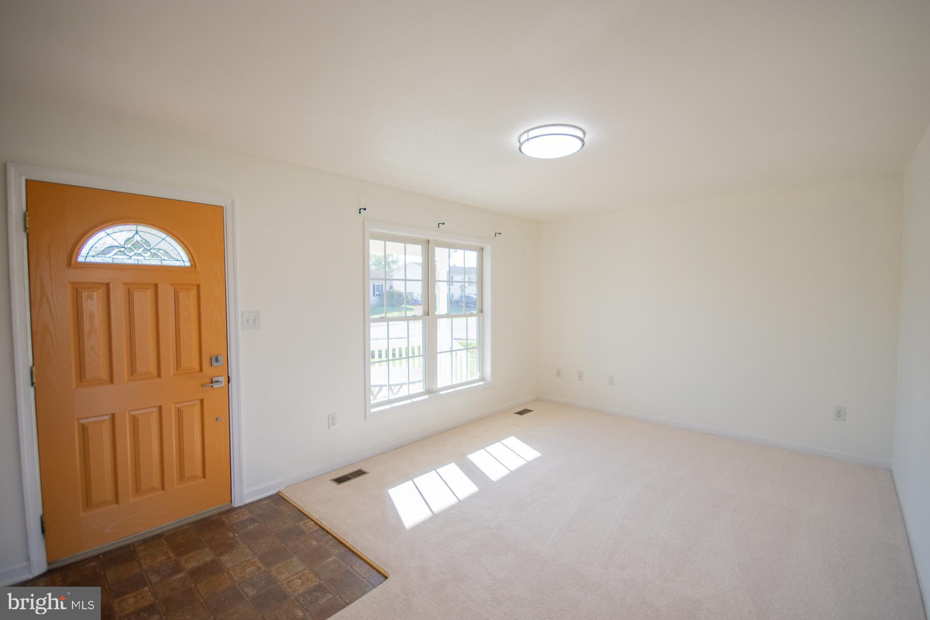 40 Stiles Way Ranson, WV 25438 - Photo 7 of 44 an empty room with windows and closet