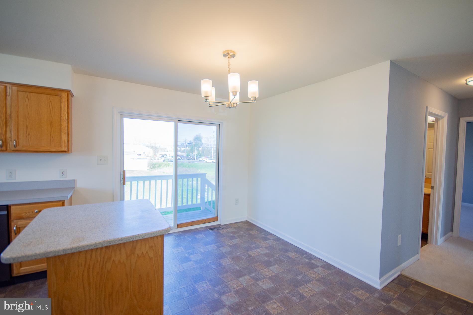 40 Stiles Way Ranson, WV 25438 - Photo 10 of 44 wooden floor in an empty room with a window