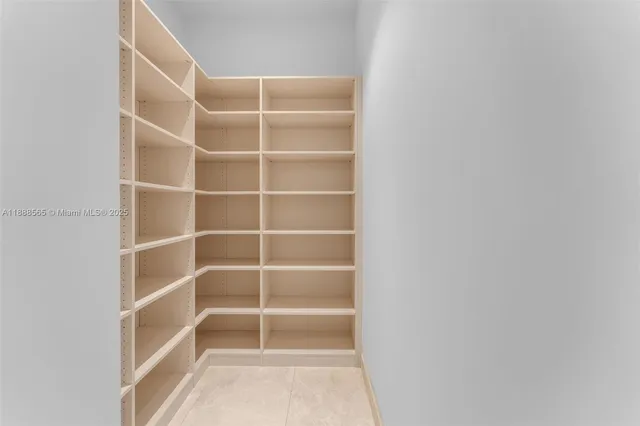 a kitchen with counter top space sink and stainless steel appliances