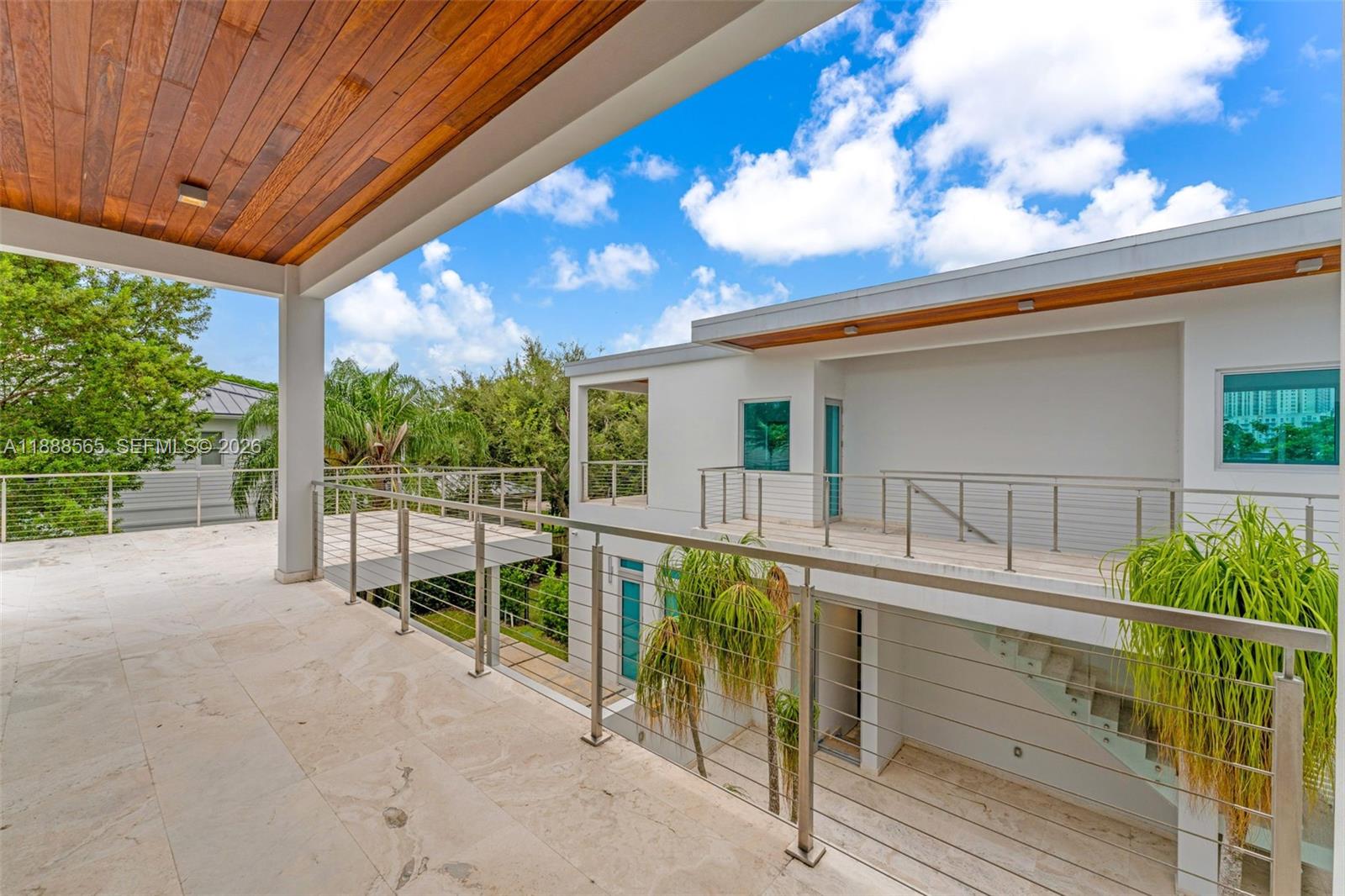 9101 Southwest 69th Court Pinecrest, FL 33156 - Photo 41 of 69 a view of balcony with furniture
