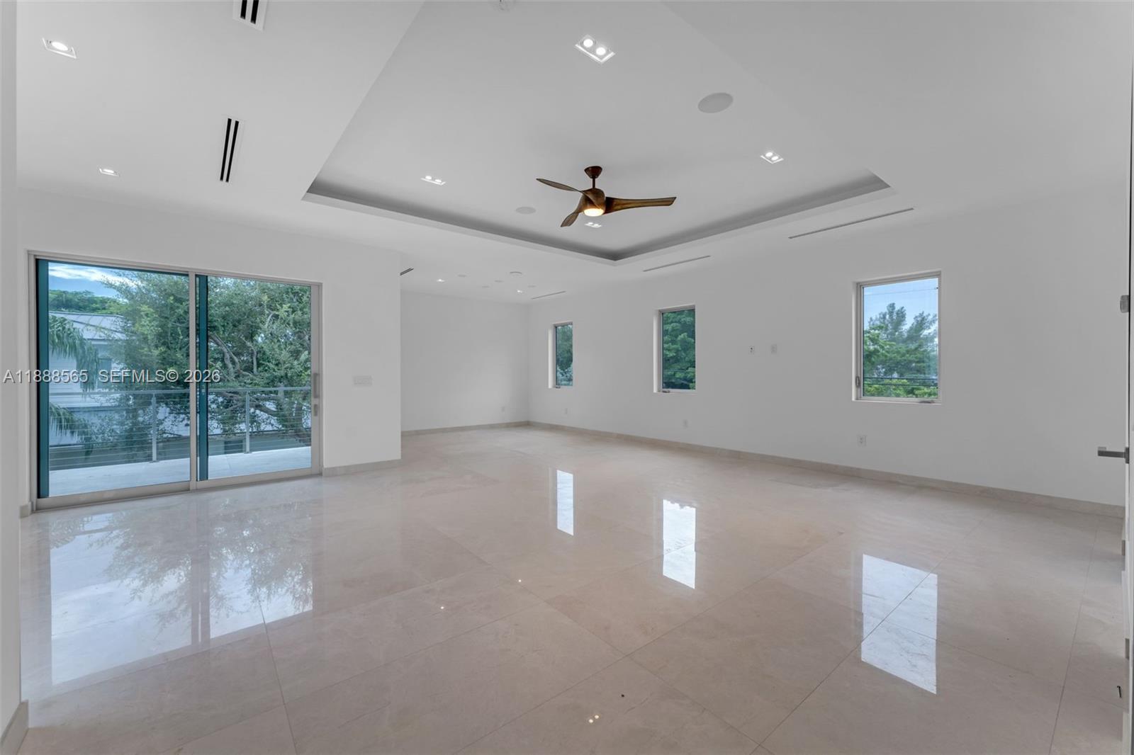 9101 Southwest 69th Court Pinecrest, FL 33156 - Photo 50 of 69 a view of an empty room with a window