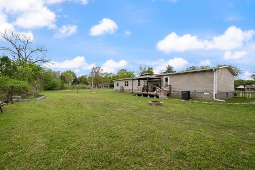 7112 Cobb Road Christiana, TN 37037 - Photo 20 of 22 a view of a house with backyard and garden