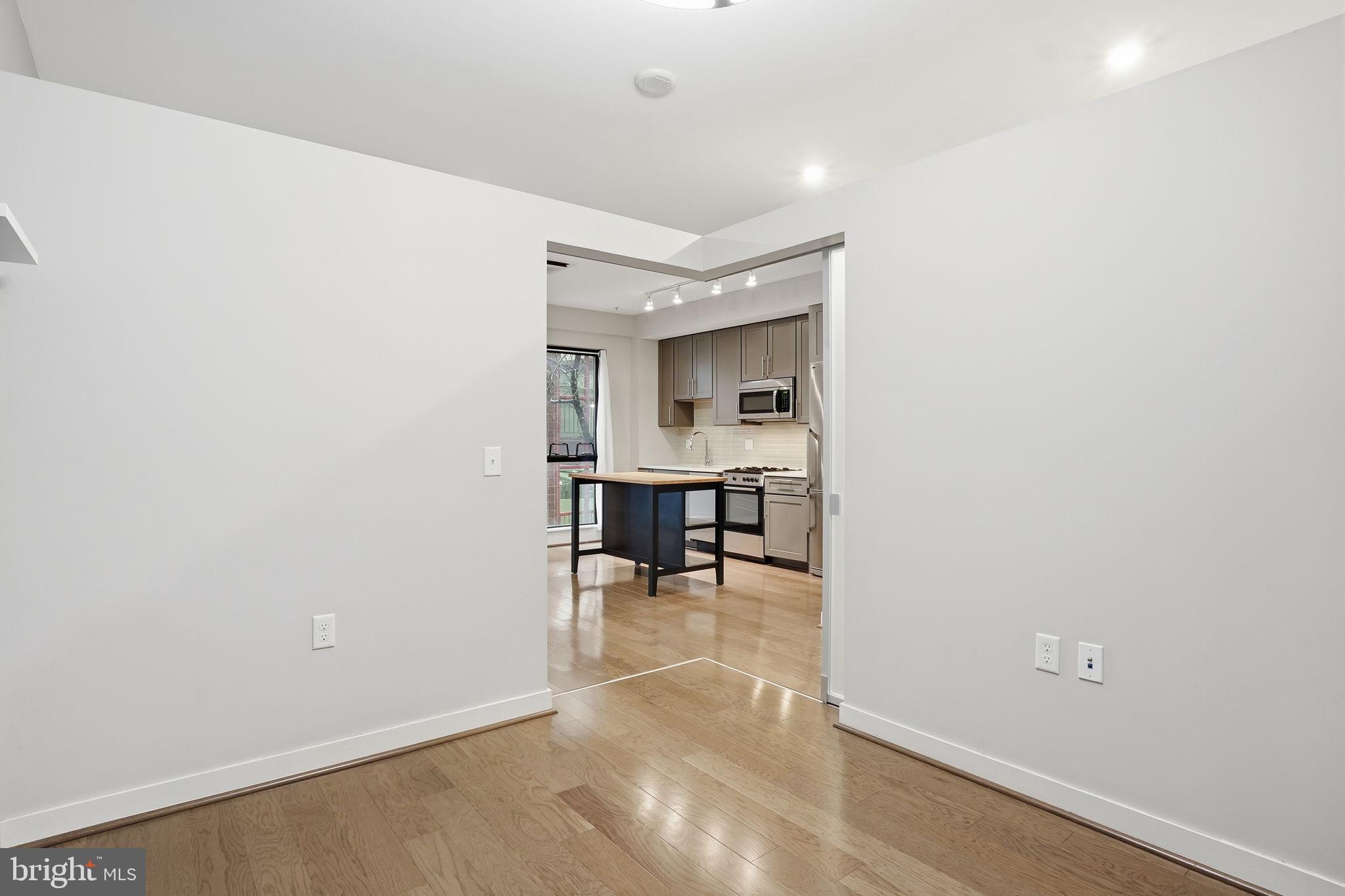 1320 Fenwick Lane, Unit 210 Silver Spring, MD 20910 - Photo 12 of 29 a view of a room with chairs and closet