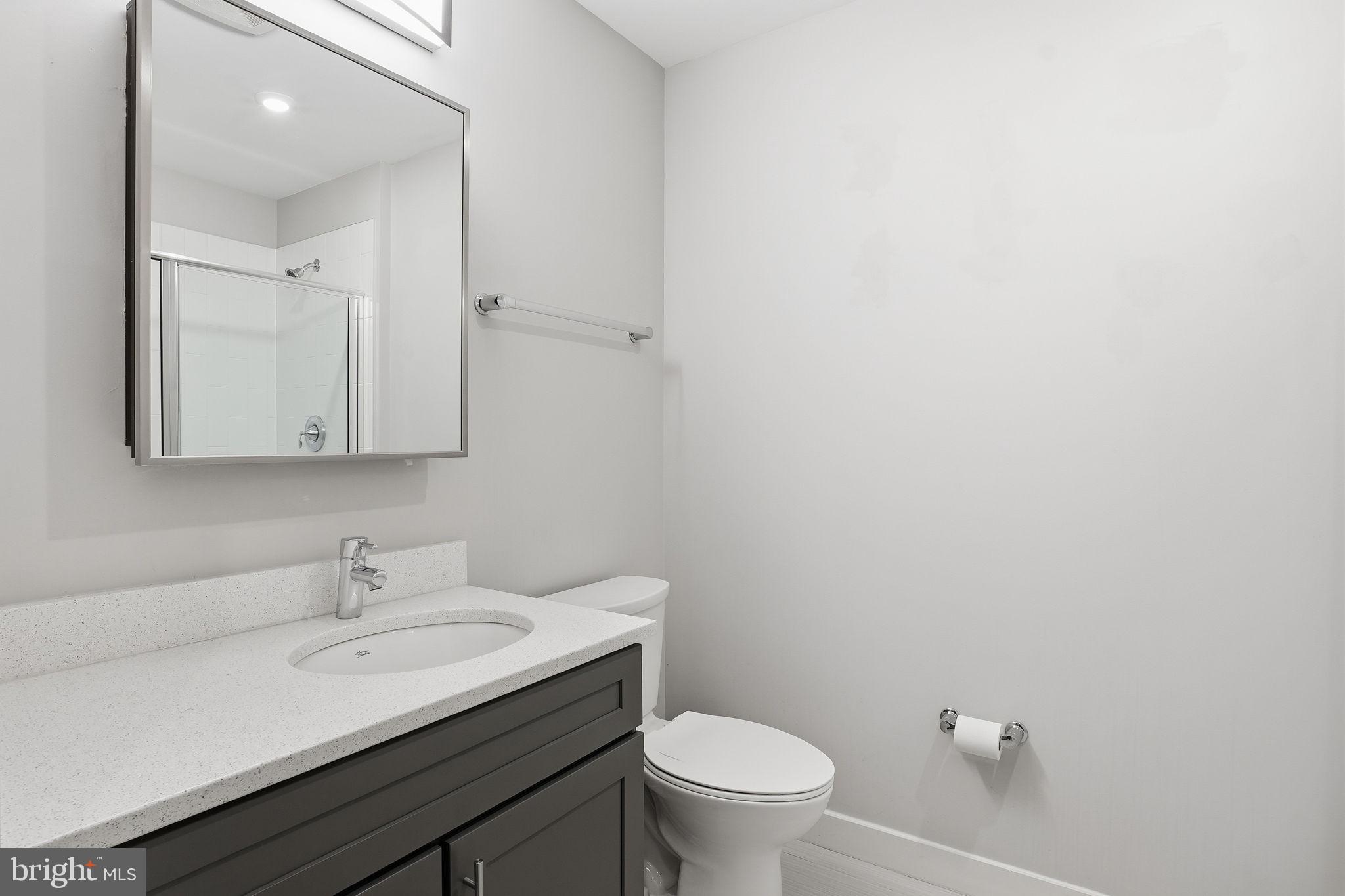 1320 Fenwick Lane, Unit 210 Silver Spring, MD 20910 - Photo 13 of 29 a bathroom with a sink and a toilet