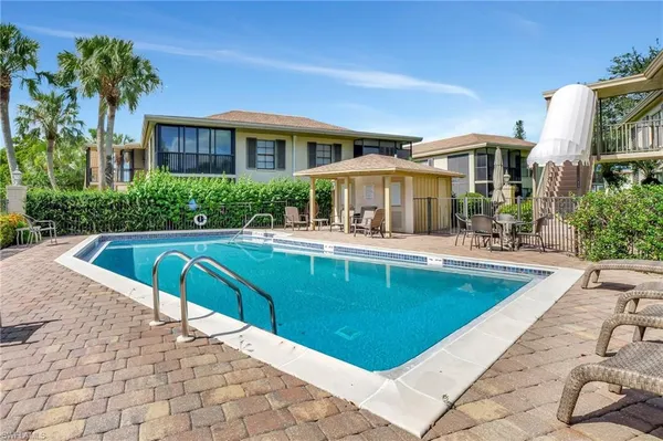 a view of a lake with a building in front of it