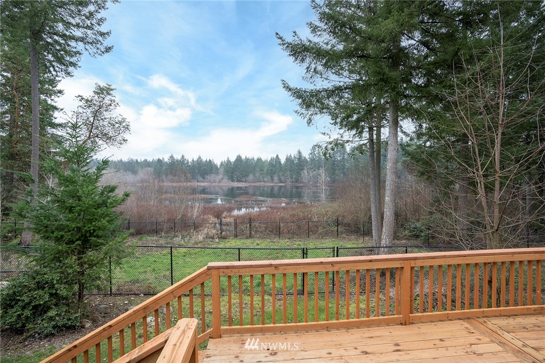 5809 Whiteman Road Southwest Longbranch, WA 98351 - Photo 31 of 40 a view of a balcony with yard