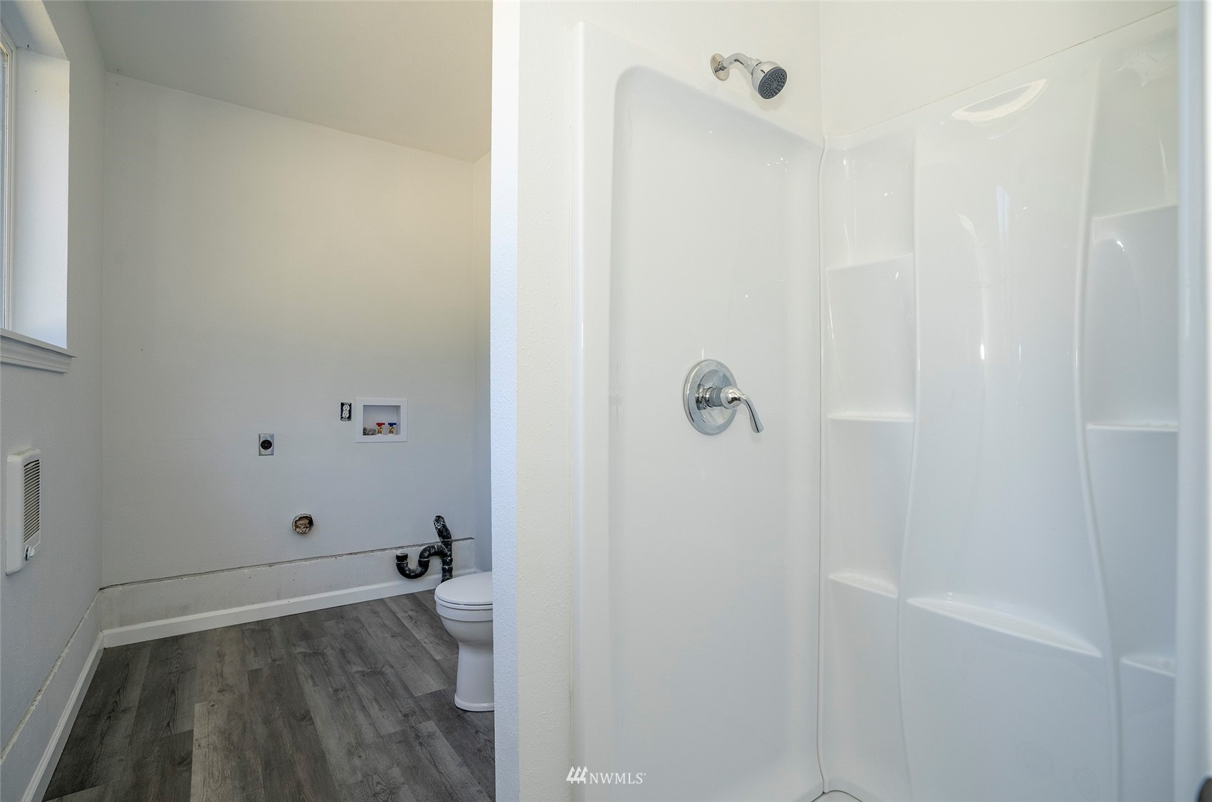 5809 Whiteman Road Southwest Longbranch, WA 98351 - Photo 35 of 40 a bathroom with a sink and toilet