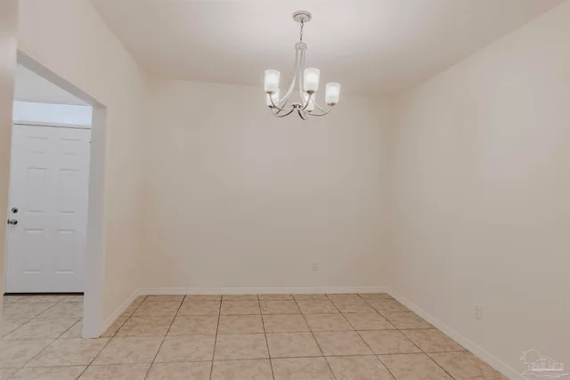 a kitchen with stainless steel appliances granite countertop a stove sink and cabinets