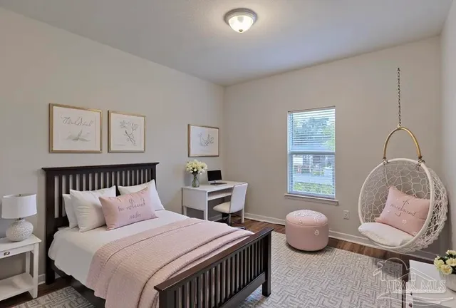 an empty room with wooden floor and closet
