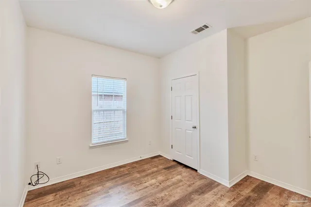 a view of a backyard with pathway