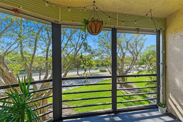 a view of a porch with a bench