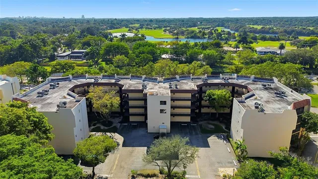 an aerial view of a house with a garden