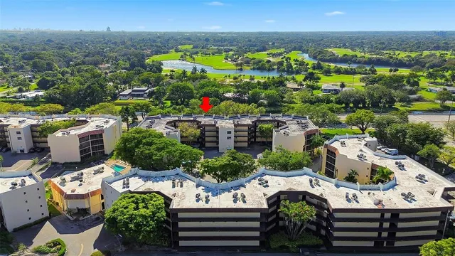 an aerial view of a house with a garden