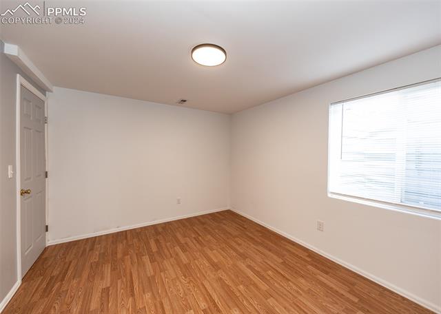 995 Winebrook Way Fountain, CO 80817 - Photo 38 of 44 Empty room featuring light hardwood / wood-style flooring