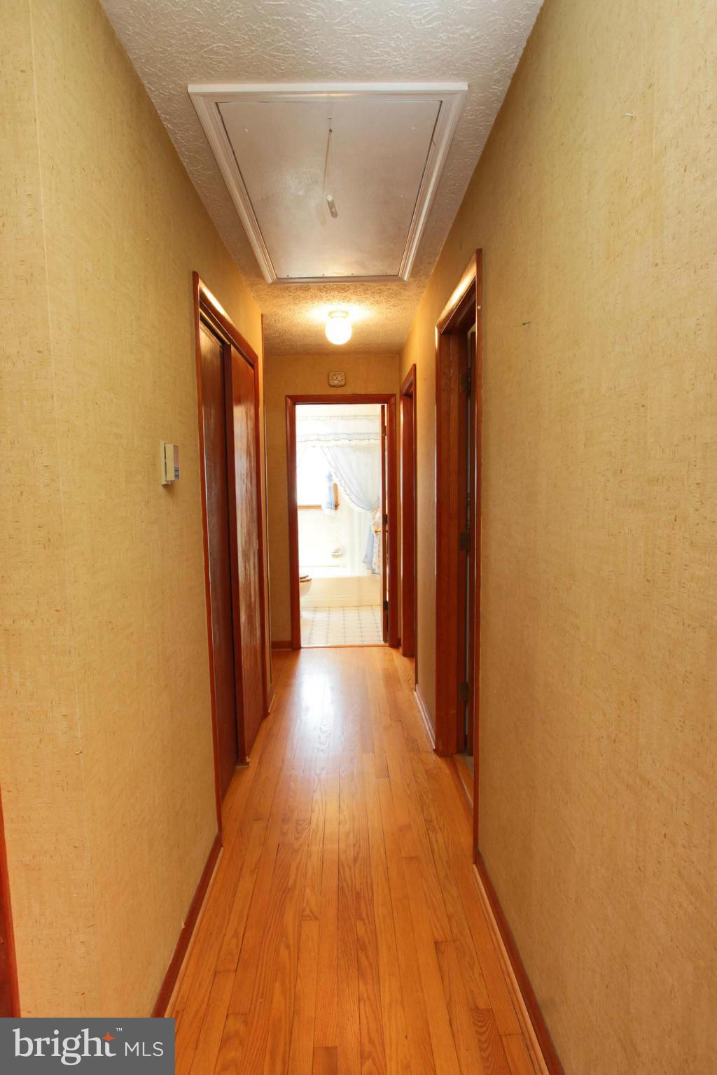 2040 Franklin Church Road Darlington, MD 21034 - Photo 12 of 30 hallway with pull down steps to attic