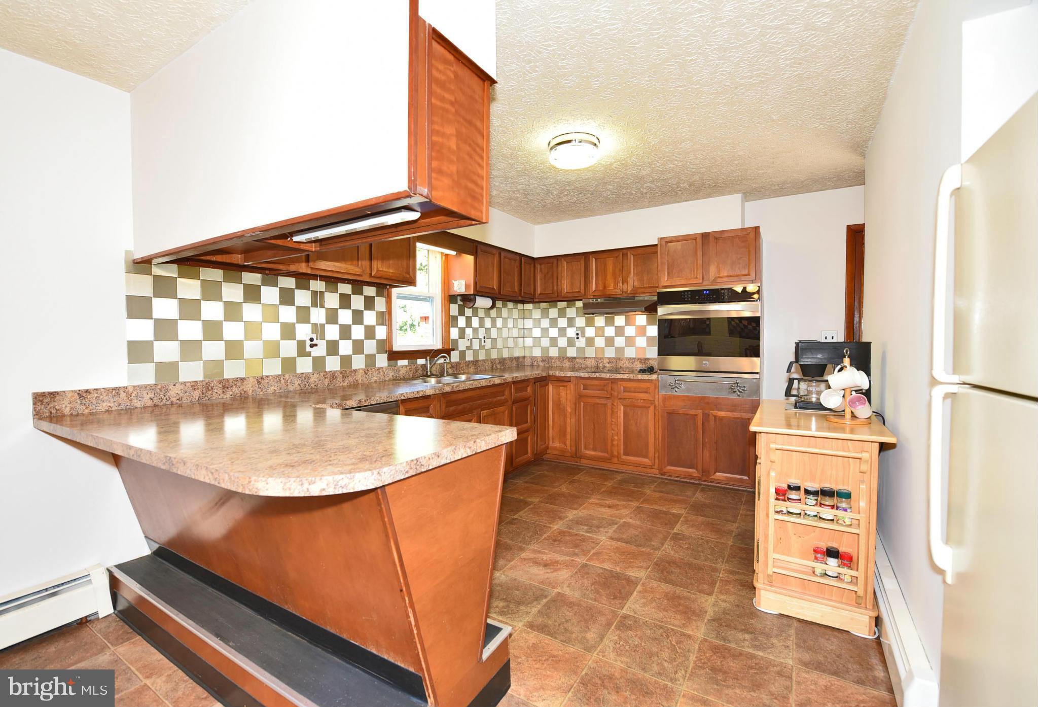 2040 Franklin Church Road Darlington, MD 21034 - Photo 8 of 30 Breakfast Bar Allows for Extra Seating