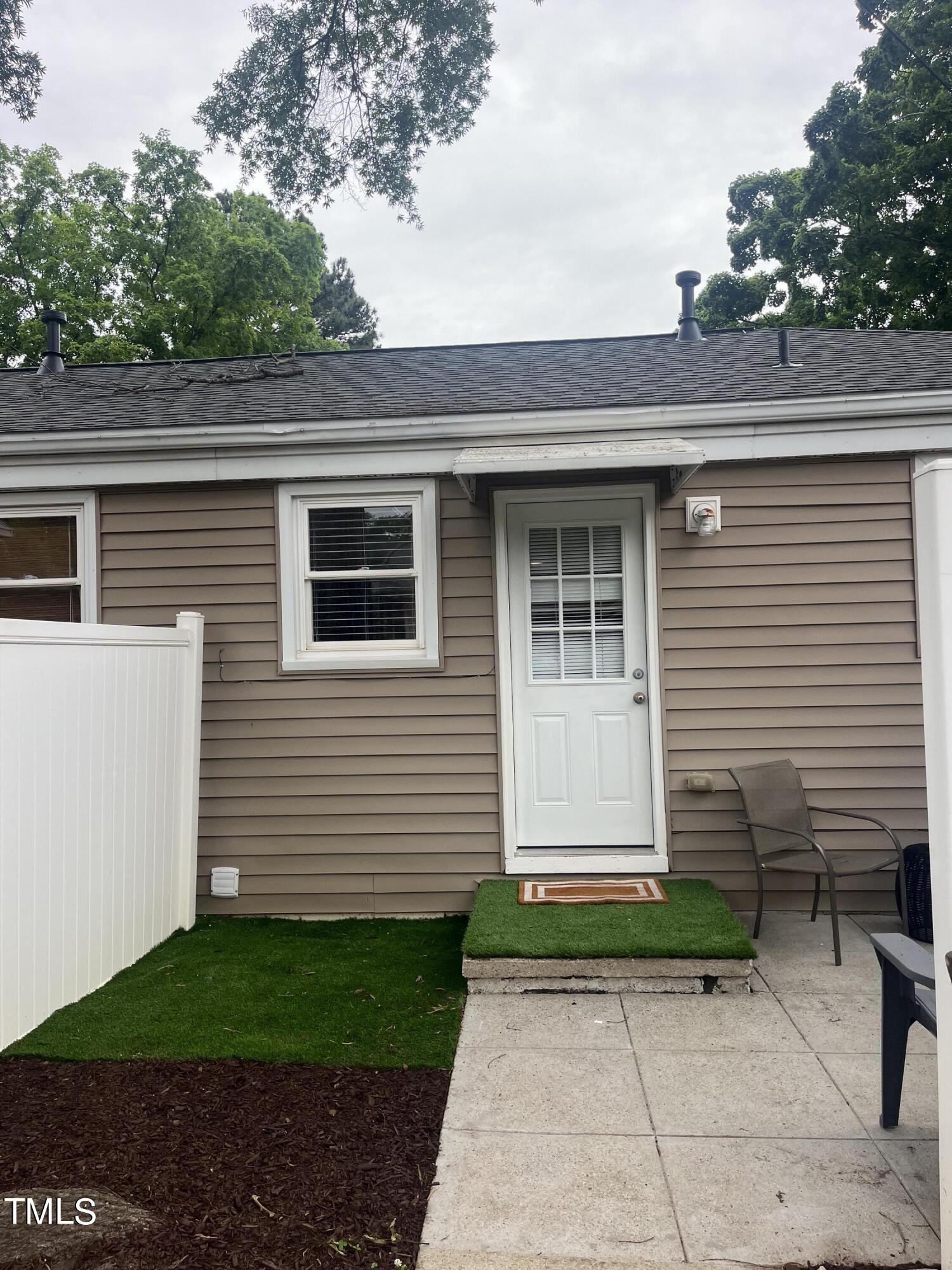 2626 McNeil Street Raleigh, NC 27608 - Photo 15 of 15 a small white building with a white roof