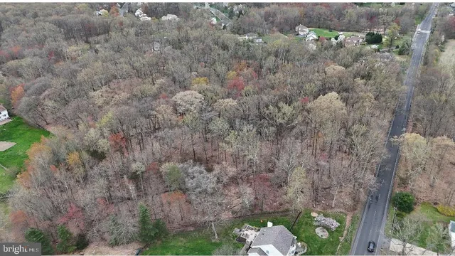 a aerial view of a house with a yard