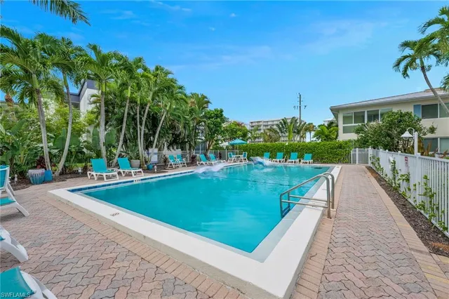 a view of swimming pool with a garden