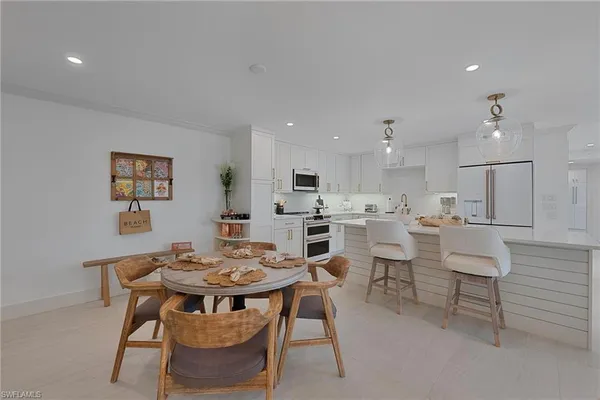 a view of a dining room with furniture