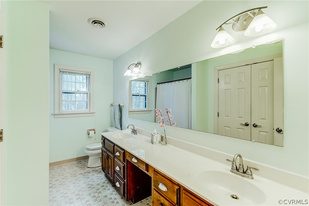 1810 Locust Hill Road Henrico, VA 23238 - Photo 33 of 41 Upstairs full bath with double sinks, makeup vanit