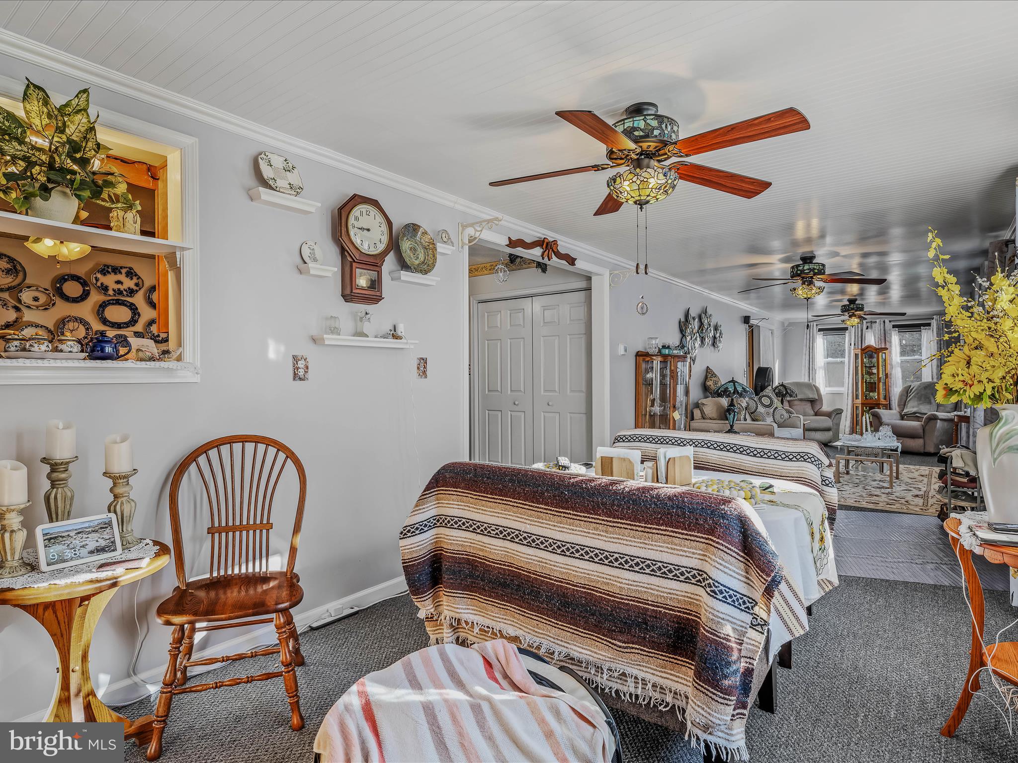 154 Brooklyn's Way Great Cacapon, WV 25422 - Photo 19 of 64 a bedroom with a bed and a chair