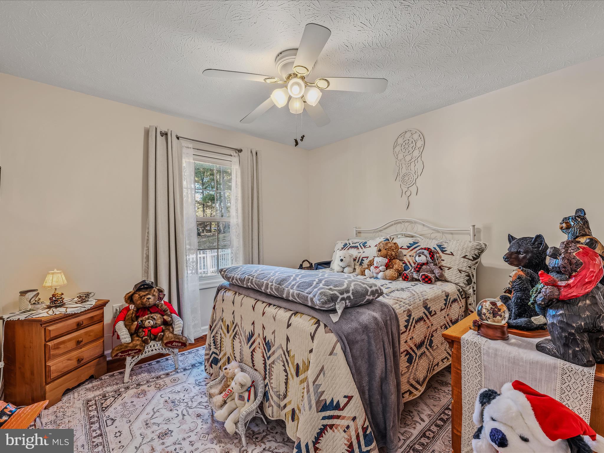 154 Brooklyn's Way Great Cacapon, WV 25422 - Photo 28 of 64 a bedroom with bed and window