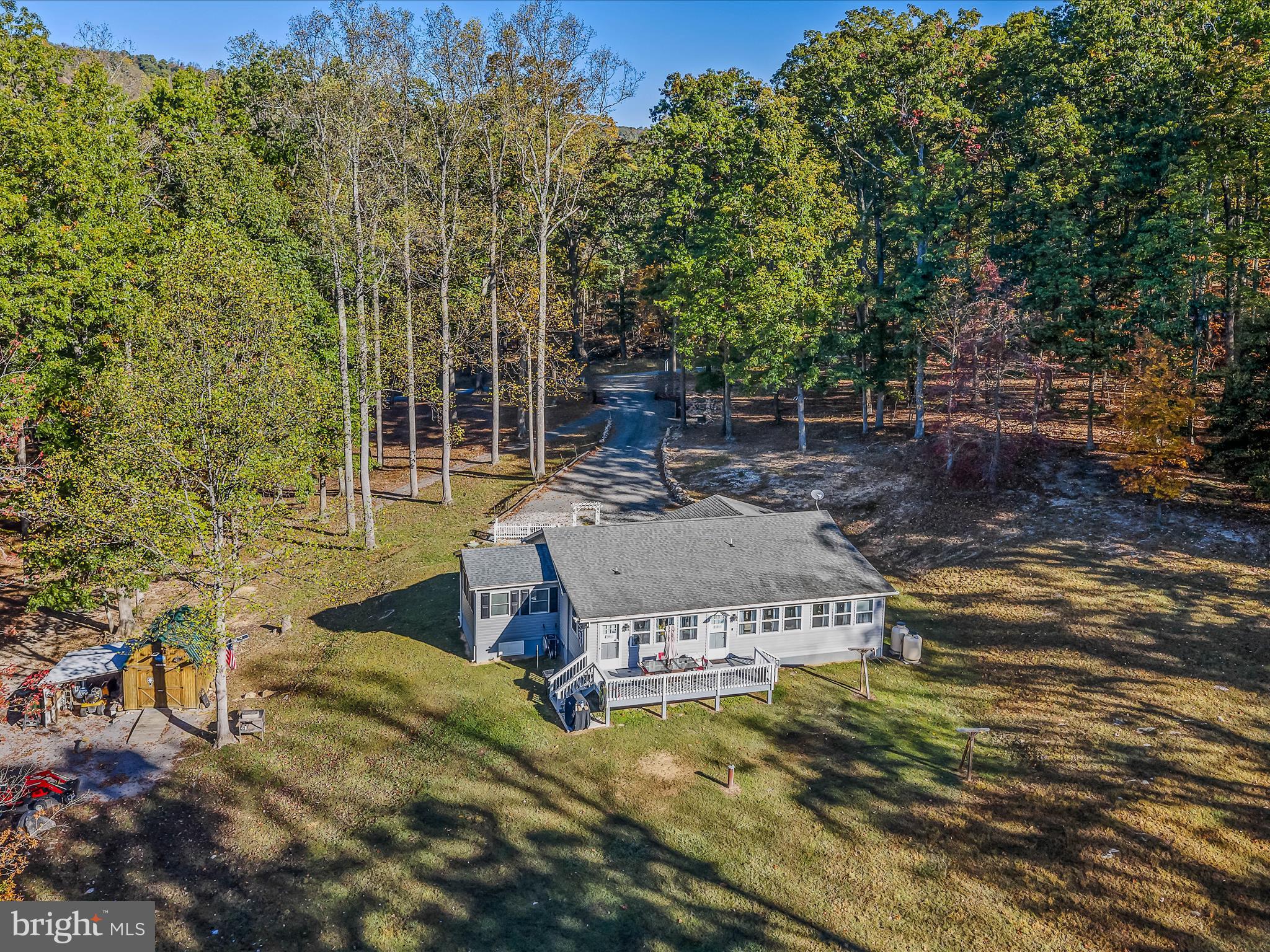 154 Brooklyn's Way Great Cacapon, WV 25422 - Photo 41 of 64 a aerial view of a house with swimming pool