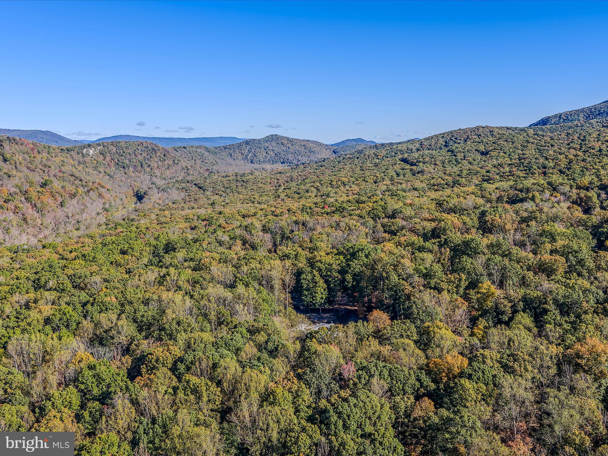 154 Brooklyn's Way Great Cacapon, WV 25422 - Photo 52 of 64 a view of a large mountain with mountains in the background