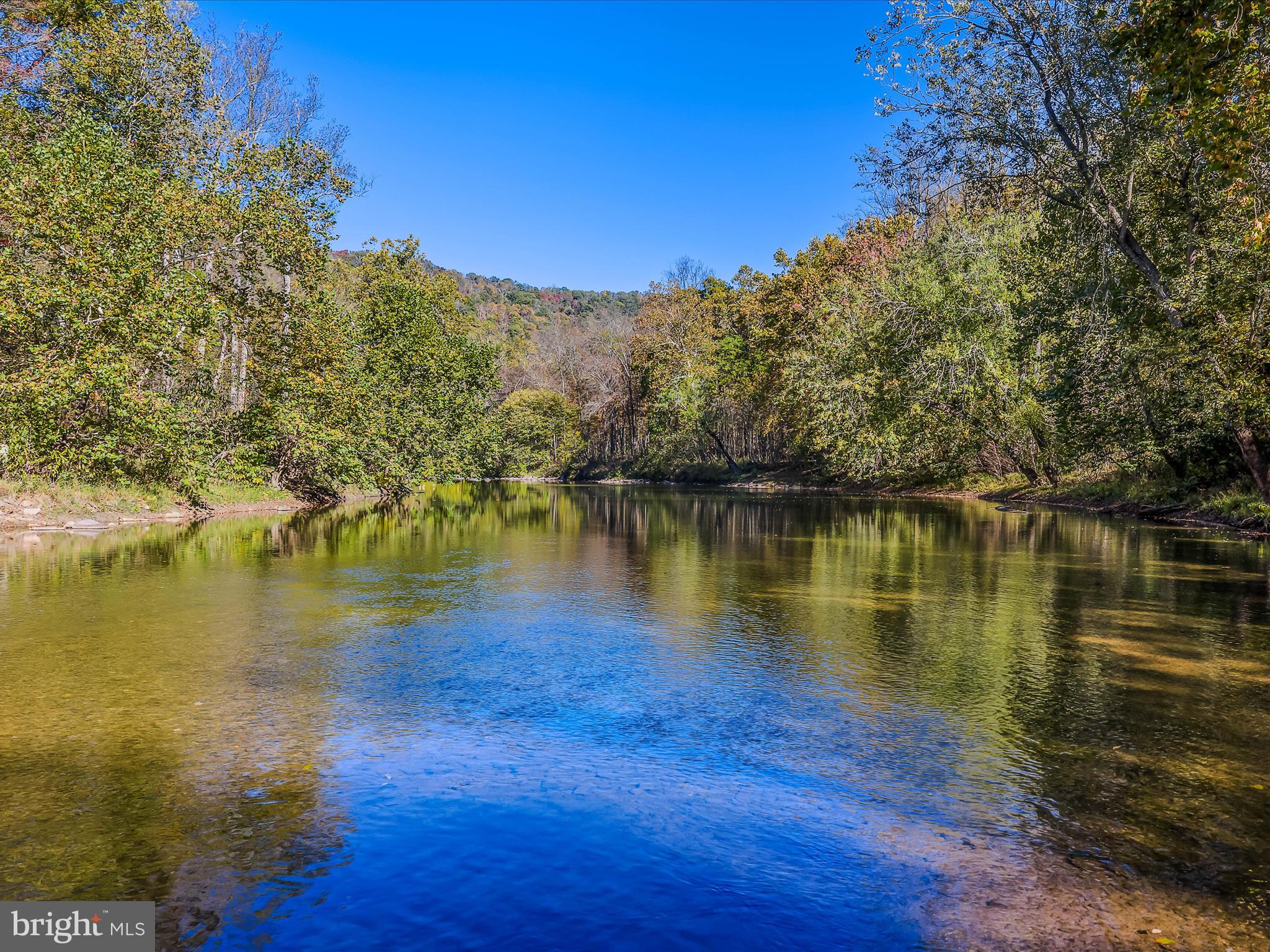 154 Brooklyn's Way Great Cacapon, WV 25422 - Photo 62 of 64 a view of a lake with houses