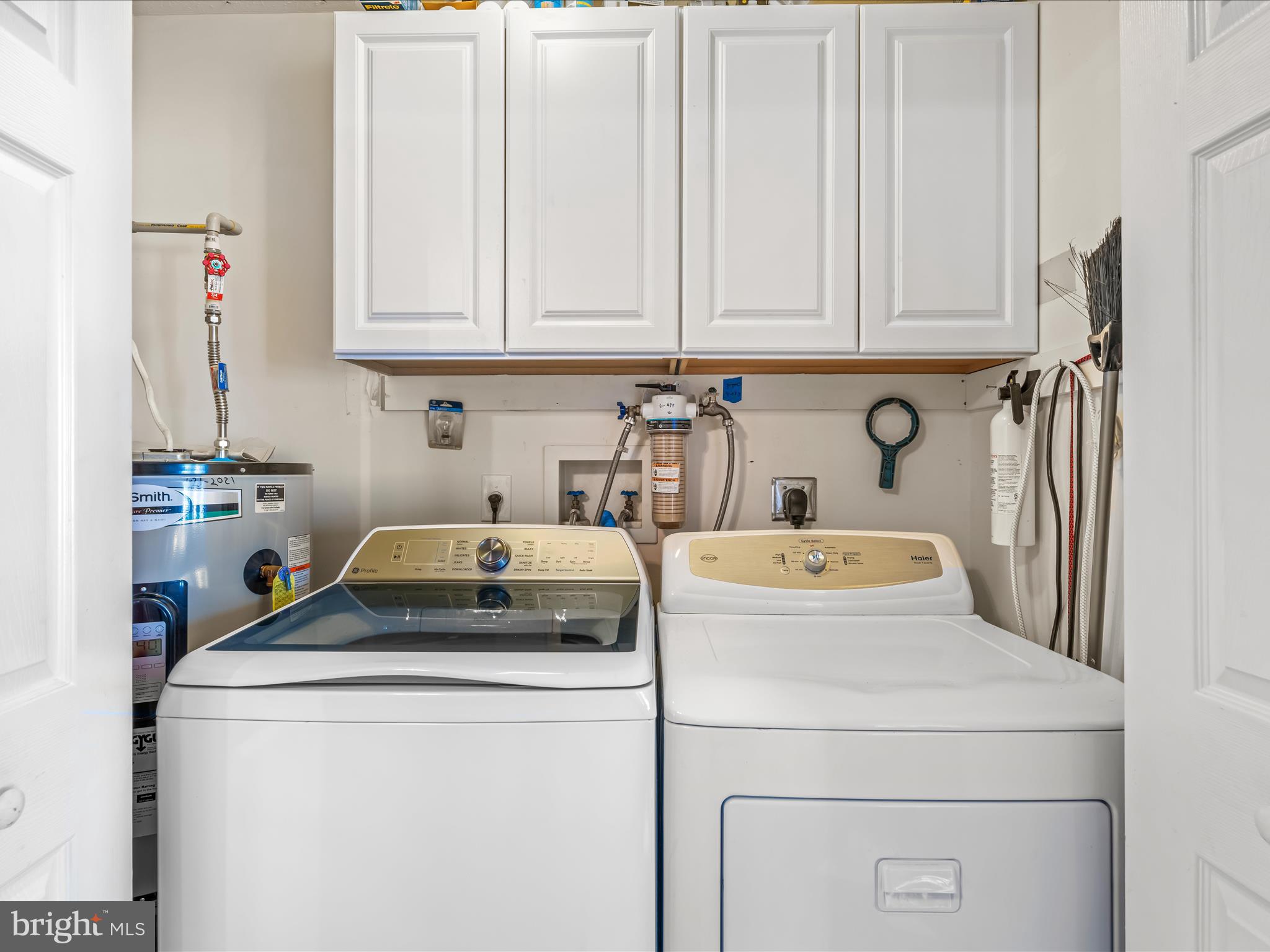 154 Brooklyn's Way Great Cacapon, WV 25422 - Photo 7 of 64 a utility room with dryer and washer
