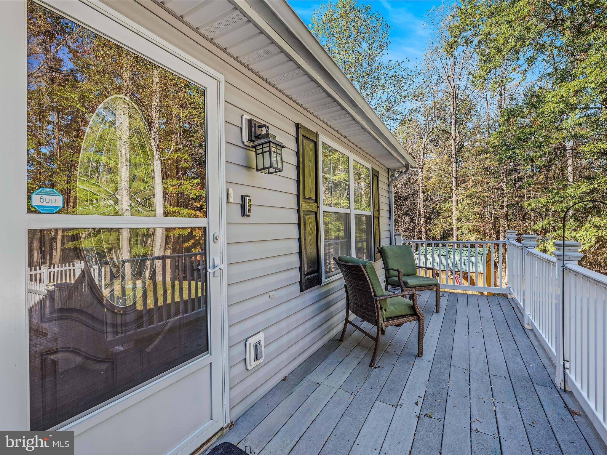 154 Brooklyn's Way Great Cacapon, WV 25422 - Photo 9 of 64 a view of a house with a chairs and wooden floor