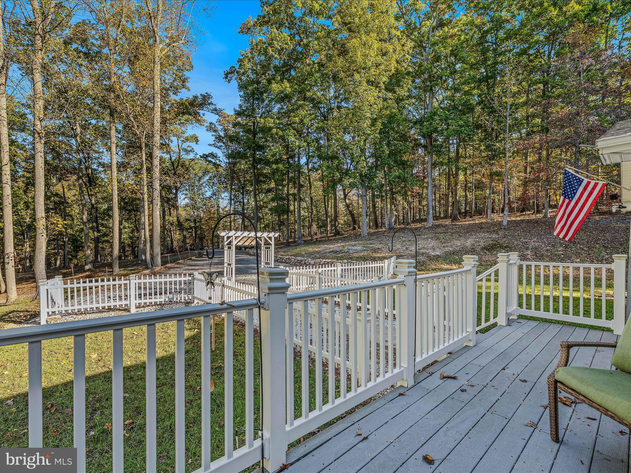 154 Brooklyn's Way Great Cacapon, WV 25422 - Photo 10 of 64 a view of deck with a large trees