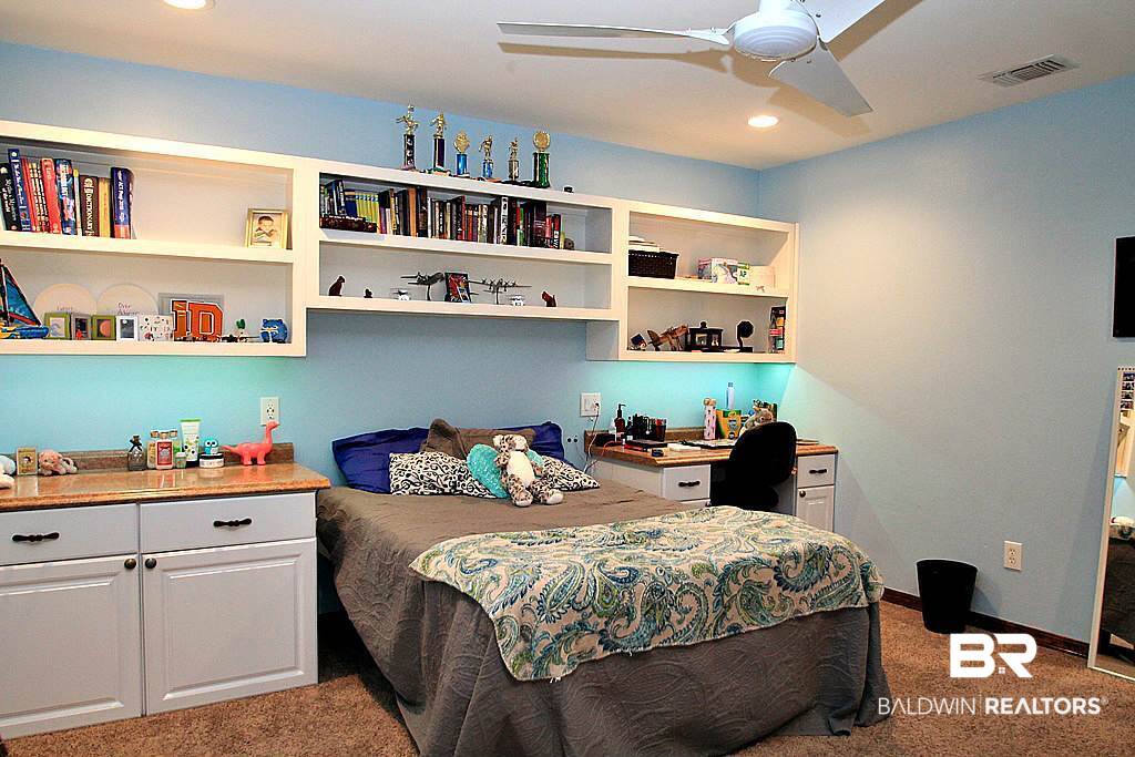 106 Winnetk Circle Daphne, AL 36526 - Photo 24 of 39 Built In Shelves & Desk in this BIG Bedroom