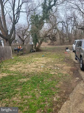a view of backyard with green space