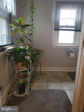 a vase of flowers sitting on a table