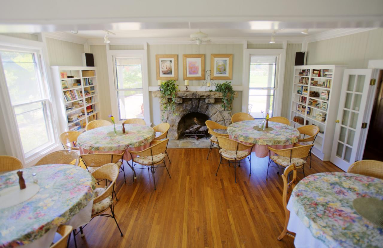 2720 Painted Cave Road Santa Barbara, CA 93105 - Photo 12 of 23 a view of a dining room with furniture and a book shelf