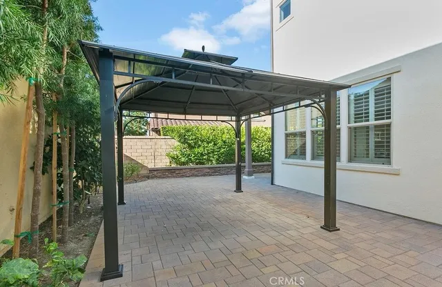 a view of backyard with green space